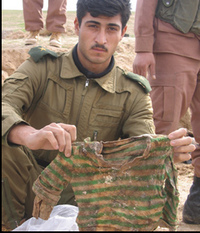 Soldier with child's shirt