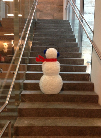 Snowman ascending stairs