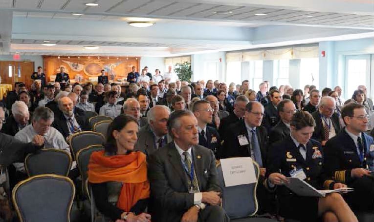 Attendees sit watching at Leadership for The Arctic Conference