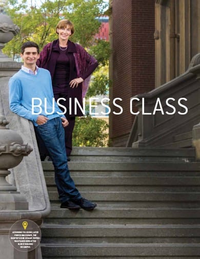 Nancy Heinen ’82 and Kevin Marshack ’19 perch on the steps of South Hall.