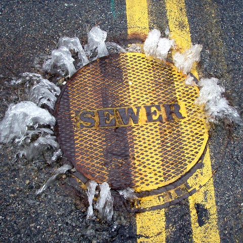 Photo: Mystic River Watershed Association, “Sewer overflowing”