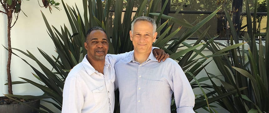 Jon Eldan ’02 (right) with After Innocence client Maurice Caldwell.