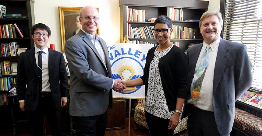 HANDS ON: UC Merced Associate Vice Chancellor Peter Schuerman and Berkeley Law Interim Dean Melissa Murray (center) forge a promising partnership.