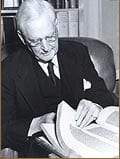 Lloyd McCullough Robbins reading a manuscript.