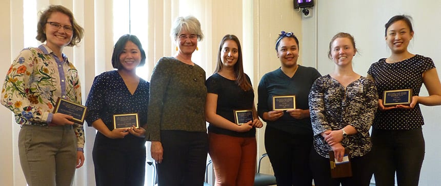 Jim Fahey Safe Homes for Women Fellowship awards 2018. From left to right: Ali Sadler (law), Michelle Unjung Kim (law), Nancy Lemon (law, giving out the awards), Karina Sweitzer (social welfare), Erica West (social welfare), Emma Halling (law), and Iris Lin (social welfare).