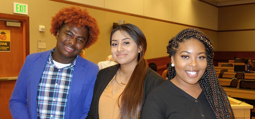 Roxanna Amador (center) with fellow CYDL students Jordan Green and Taliah Long before their mock trial.