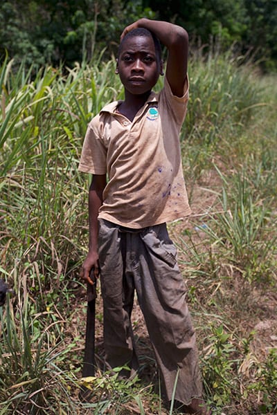 Child with a machete in the Ivory Coast