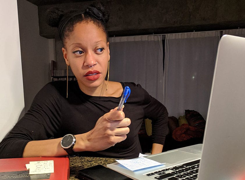 woman teaching at laptop