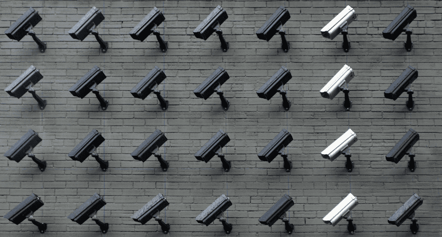 wall of surveillance cameras