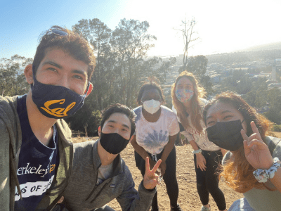 masked students posing for selfie