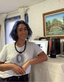 woman in front of mirror