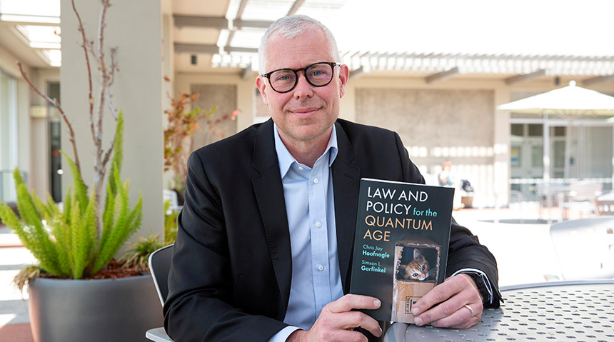 Professor Chris Hoofnagle with his new book