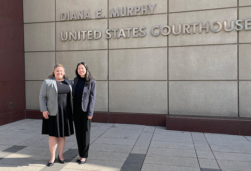 Megan Graham and Jennifer Sun outside courthouse