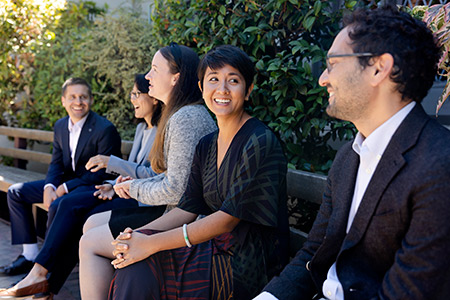 New faculty chat outside law building