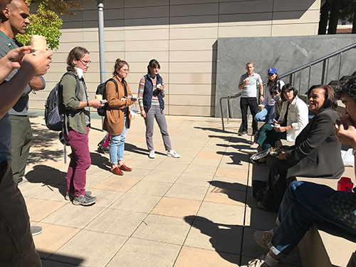 Cloey Hewlett outside with students