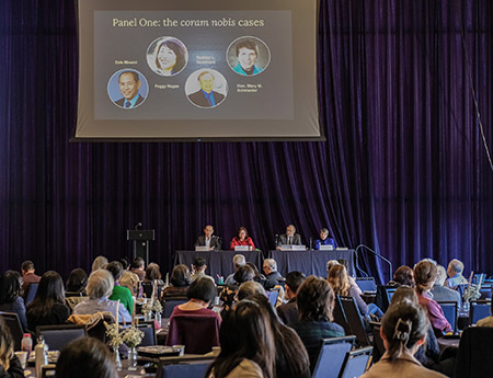 Four Panel speakers at table