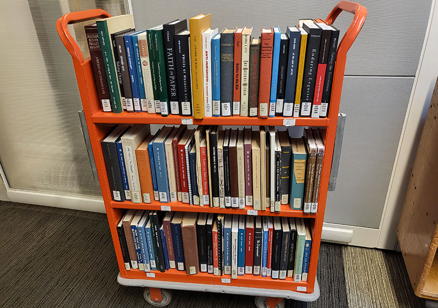 Indigenous Books on library cart
