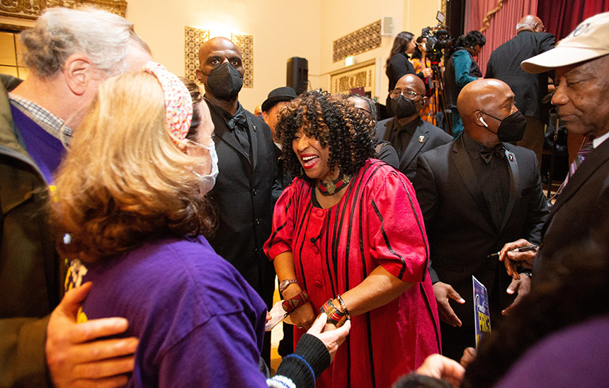 Pamela Price greeting supporters