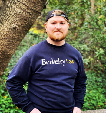 steven hensley in berkeley law sweatshirt and baseball cap