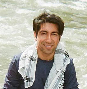 Muhammad Yusuf Tarr with water in background