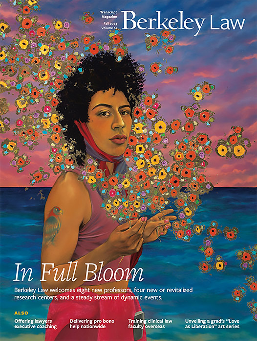 transcript fall 2023 cover, person with bird tattoo by the ocean surrounded by flowers. Links to digital edition of magazine