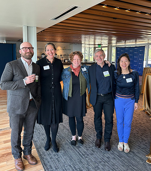 Group posing with Colleen Chien