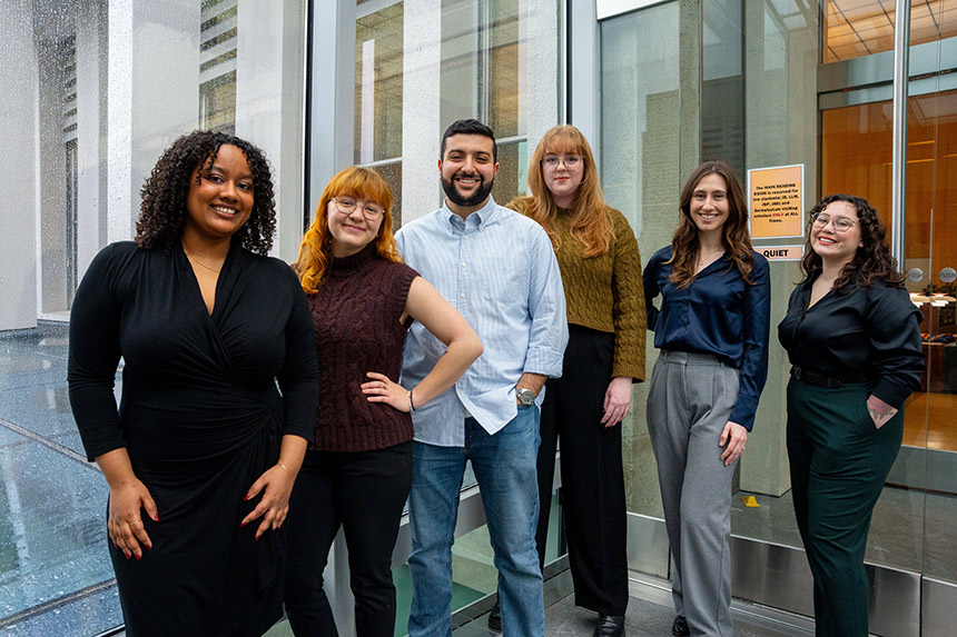 Group of six people posing