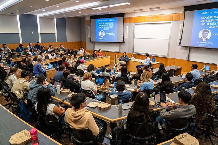 A packed Students watch Andreessen Horowitz Chief Legal Officer Jai Ramaswamy discuss balancing innovation and responsibility