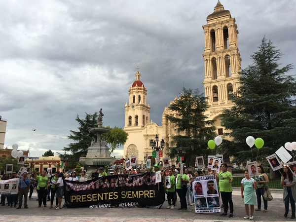 protest outside church in Mexico