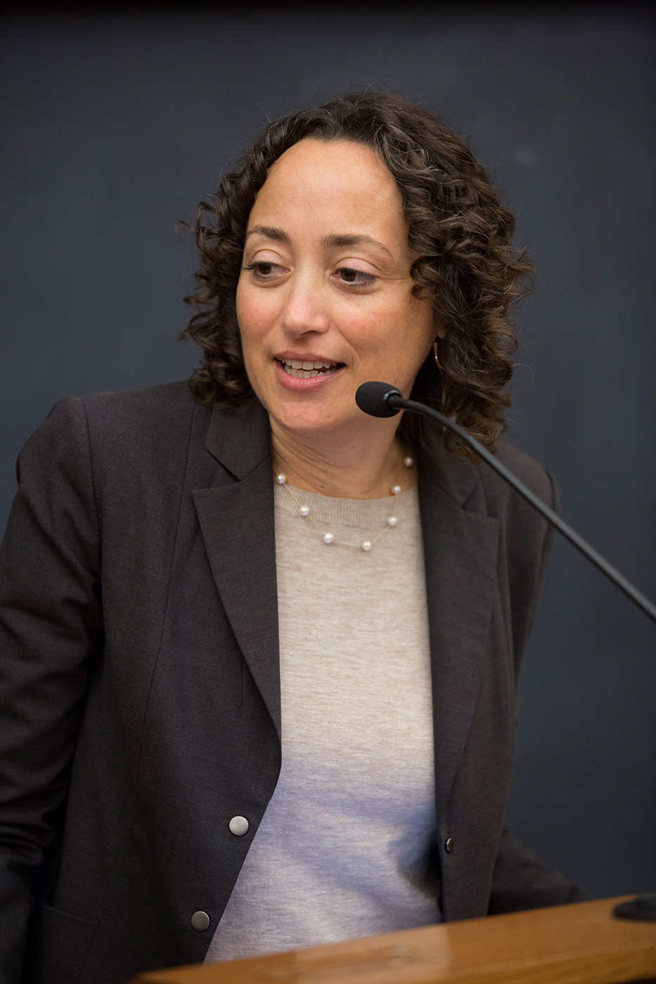 Lhamon giving speech