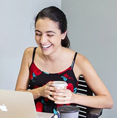 Close up of a Samuelson Clinic student at a computer